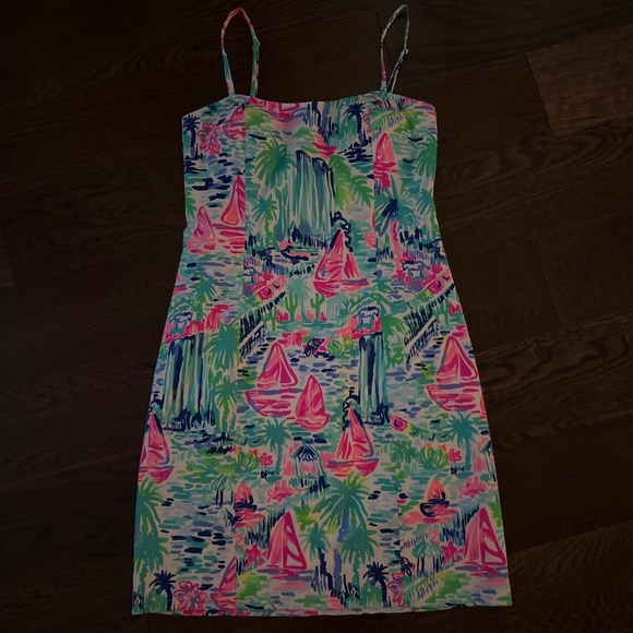 The image shows a Lilly Pulitzer Shelli Stretch Dress in a colorful, abstract pr - Picture 1 of 7